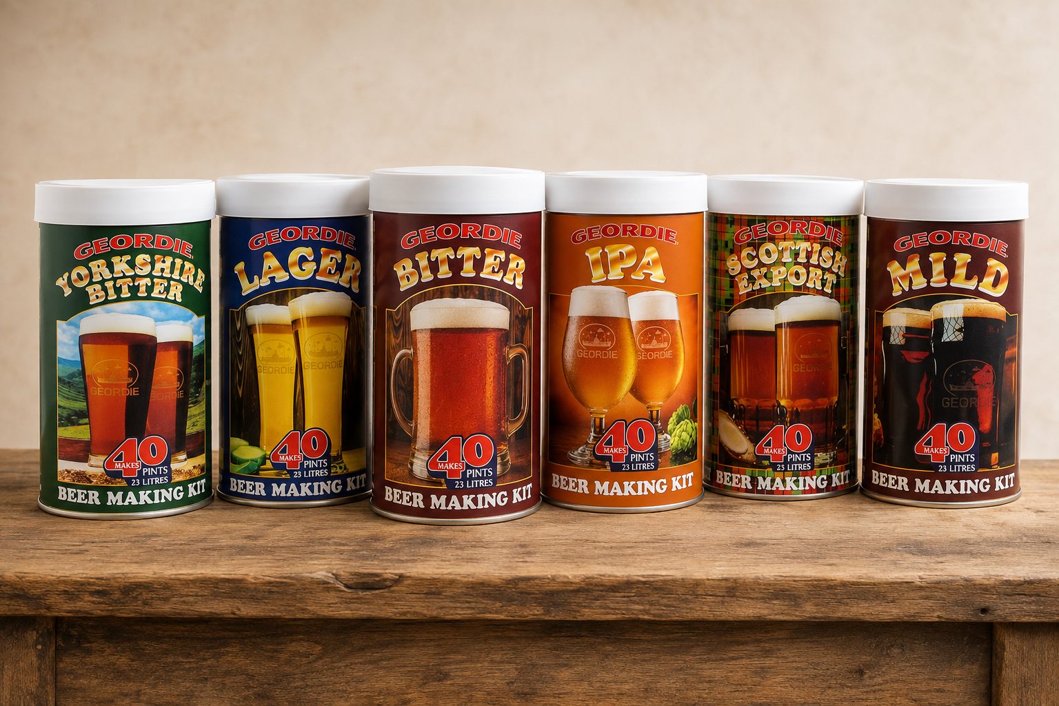 The six Geordie beer-making kit cans standing in a row on a wooden bench: Yorkshire Bitter, Lager, Bitter, IPA, Scottish Export and Mild, each a single tin with its own label colours and the 40-pints mark.